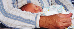 Sally, born 2 February 1999, asleep on my lap