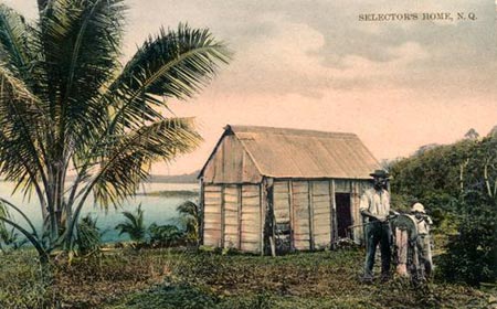'Man and child in front of a North Queensland bark hut, ca. 1900-1910' [JOL image 5447]